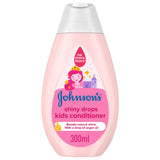GETIT.QA- Qatar’s Best Online Shopping Website offers JOHNSON'S CONDITIONER SHINY DROPS KIDS CONDITIONER 300ML at the lowest price in Qatar. Free Shipping & COD Available!