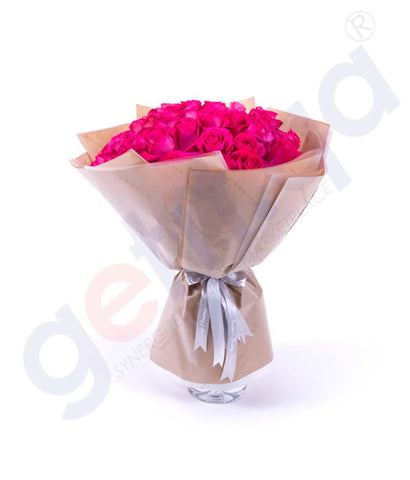 Buy Roses en Fuchsia Hand Bouquet Price Online Doha Qatar